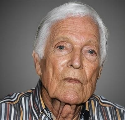 Richard Chamberlain malujący obraz, ukazujący jego pasję do sztuki i spokojne życie na Hawajach.
